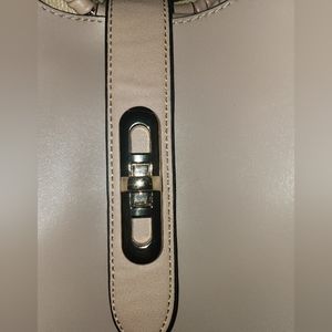 Purse light brown. Smaller purse inside bigger purse